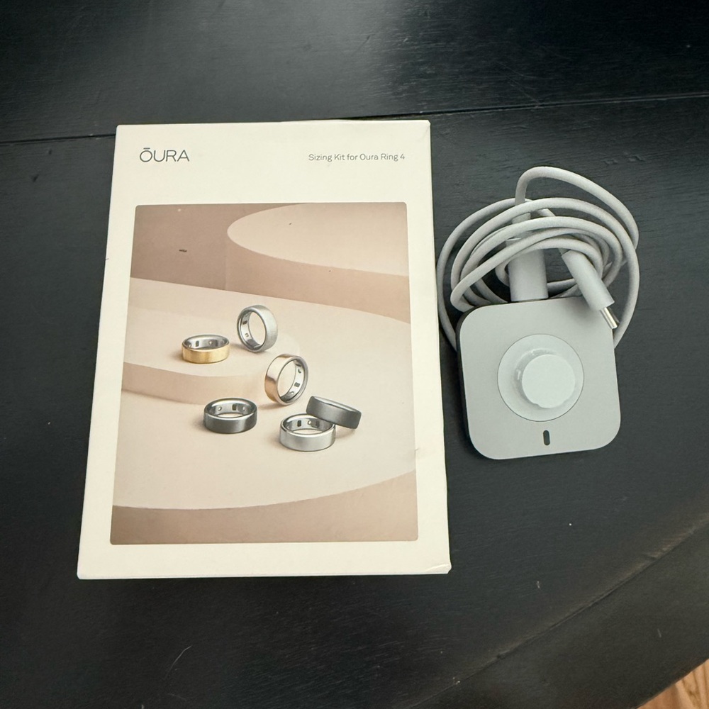 Oura Gray Charging Pad with Cable & Oura Ring sizers